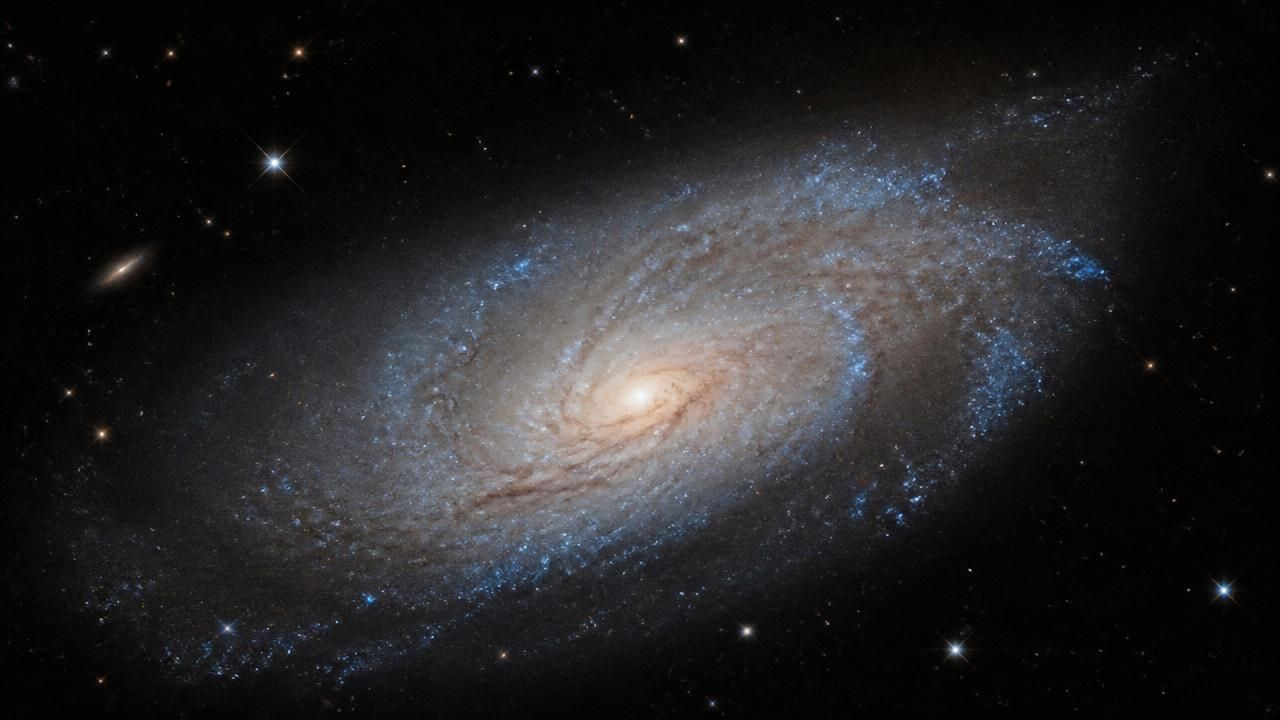 Hubble Spies One-Sided Spiral Galaxy NGC 4654 Amid Cosmic Tug-of-War