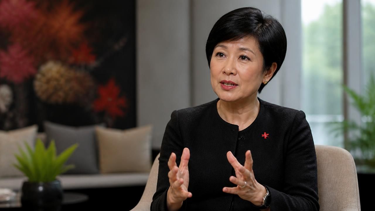 DBS CEO Tan Su Shan Bets on 'Token Paradox' as AI Costs Fall, Bank's AI Initiatives Yield $1 Billion
