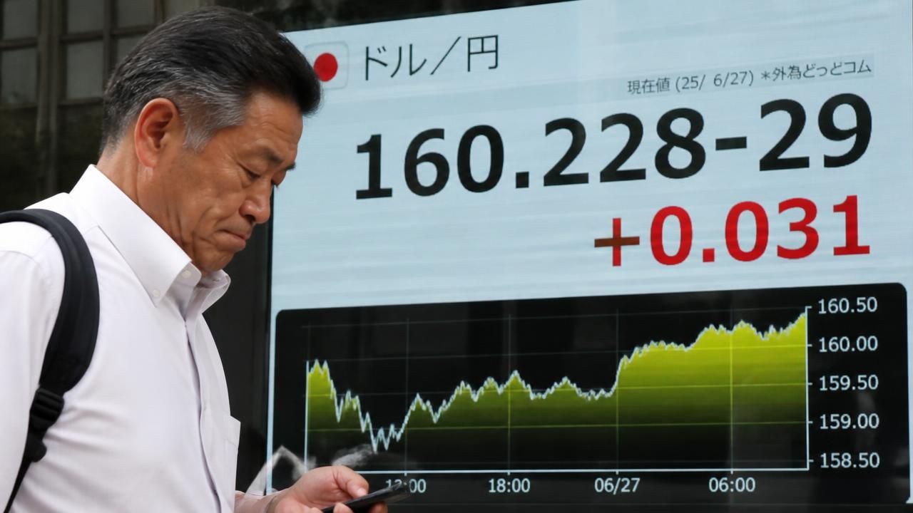 Yen's Plunge to 160 Sparks Intervention Fears as Global Markets Watch