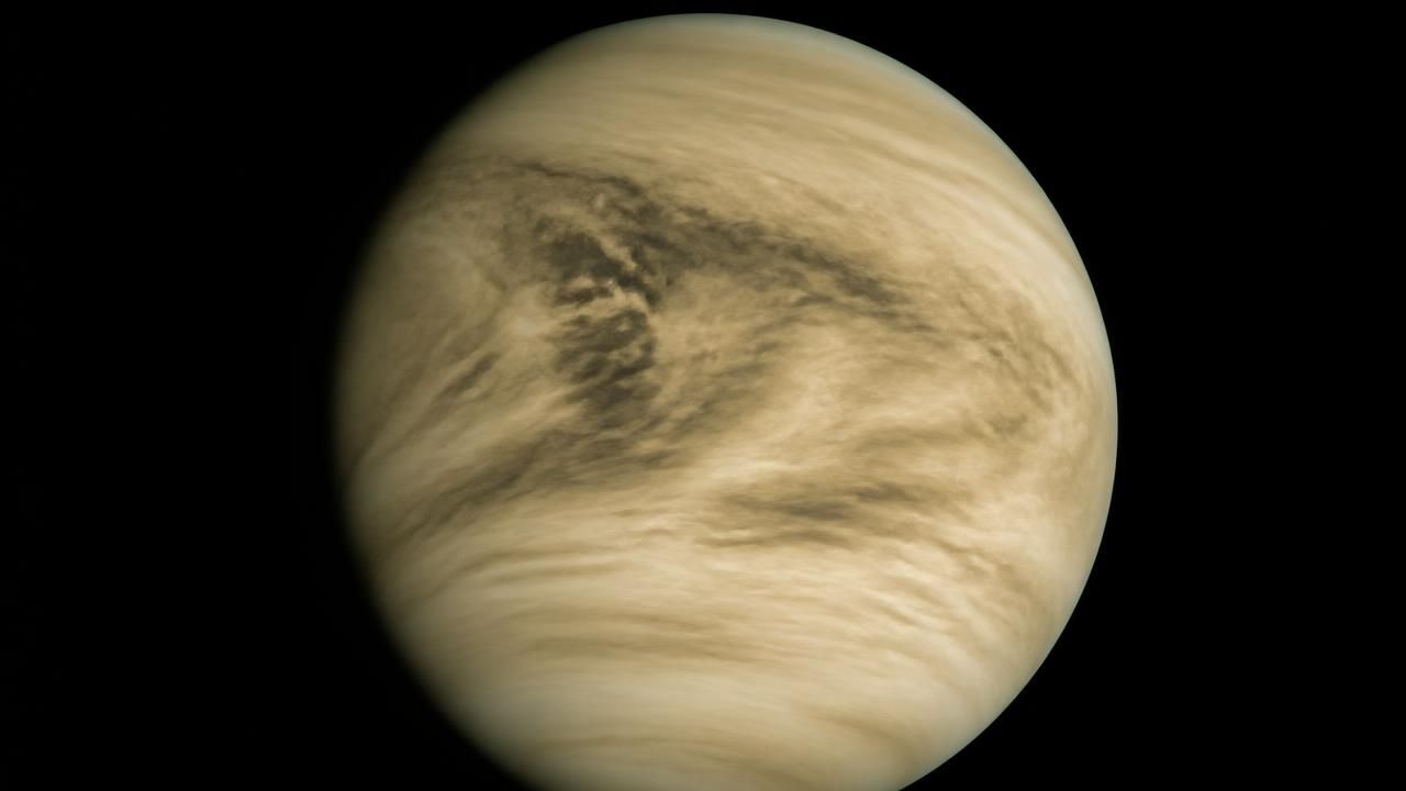 Venus's dark ultraviolet clouds: New calculations narrow mystery absorber's light-absorption range